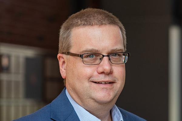 Professional headshot of Mike Renfro.